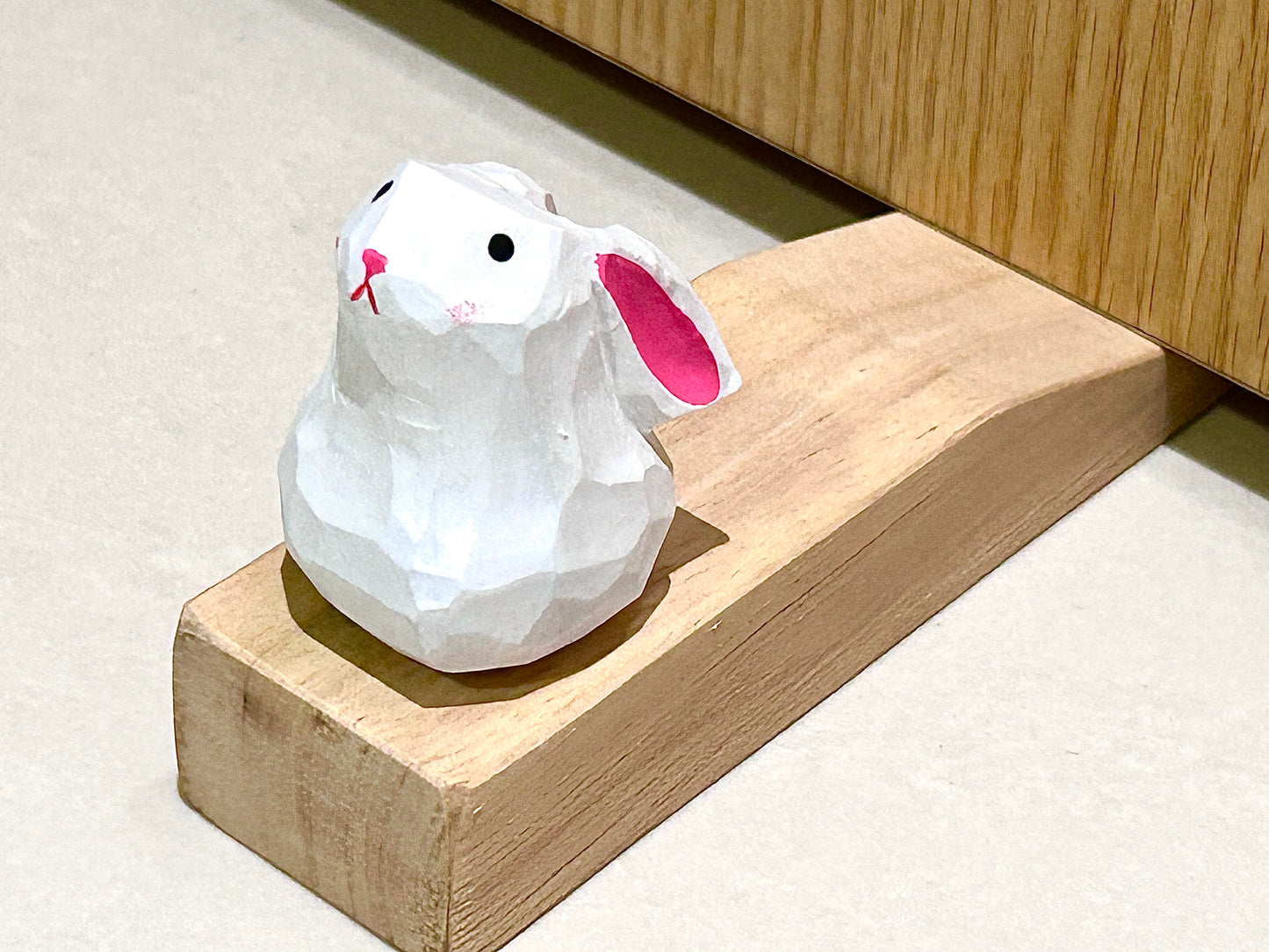 Whimsical Haven: Doorstop with Woodcarve Bunny Ornament